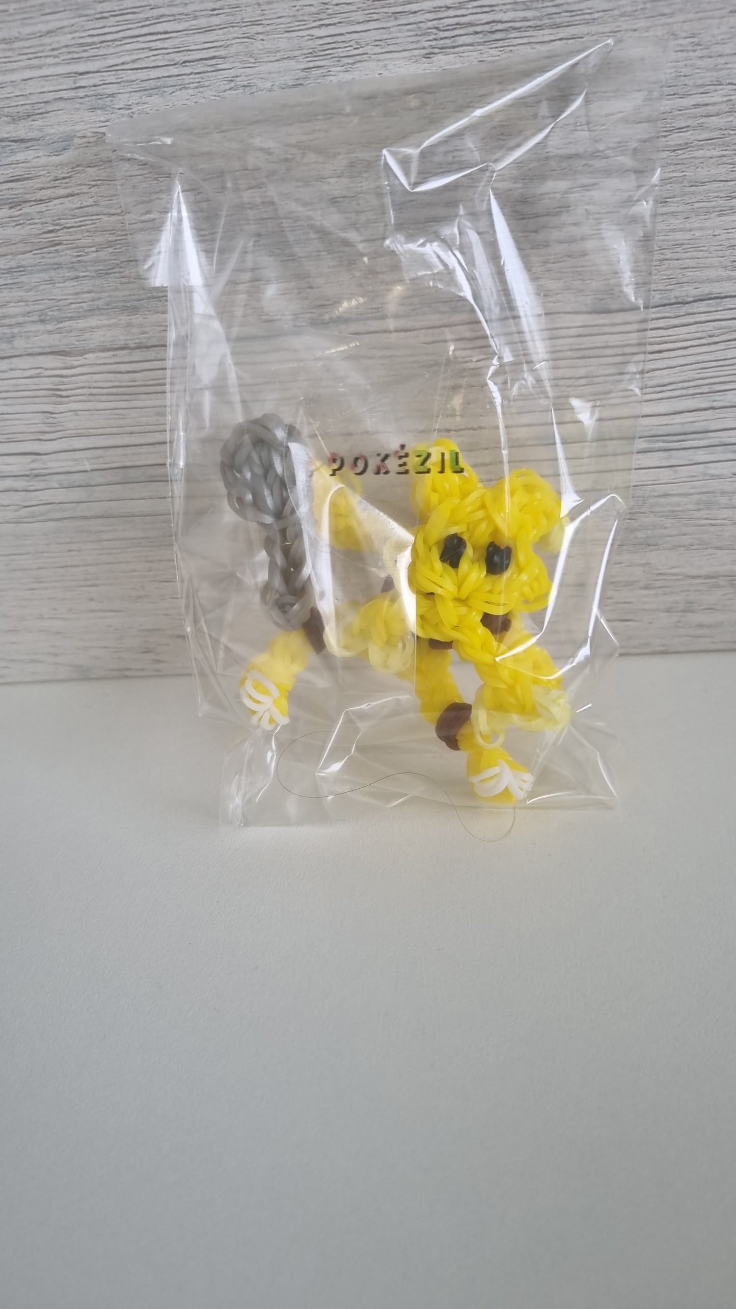 Boneco Alakazam