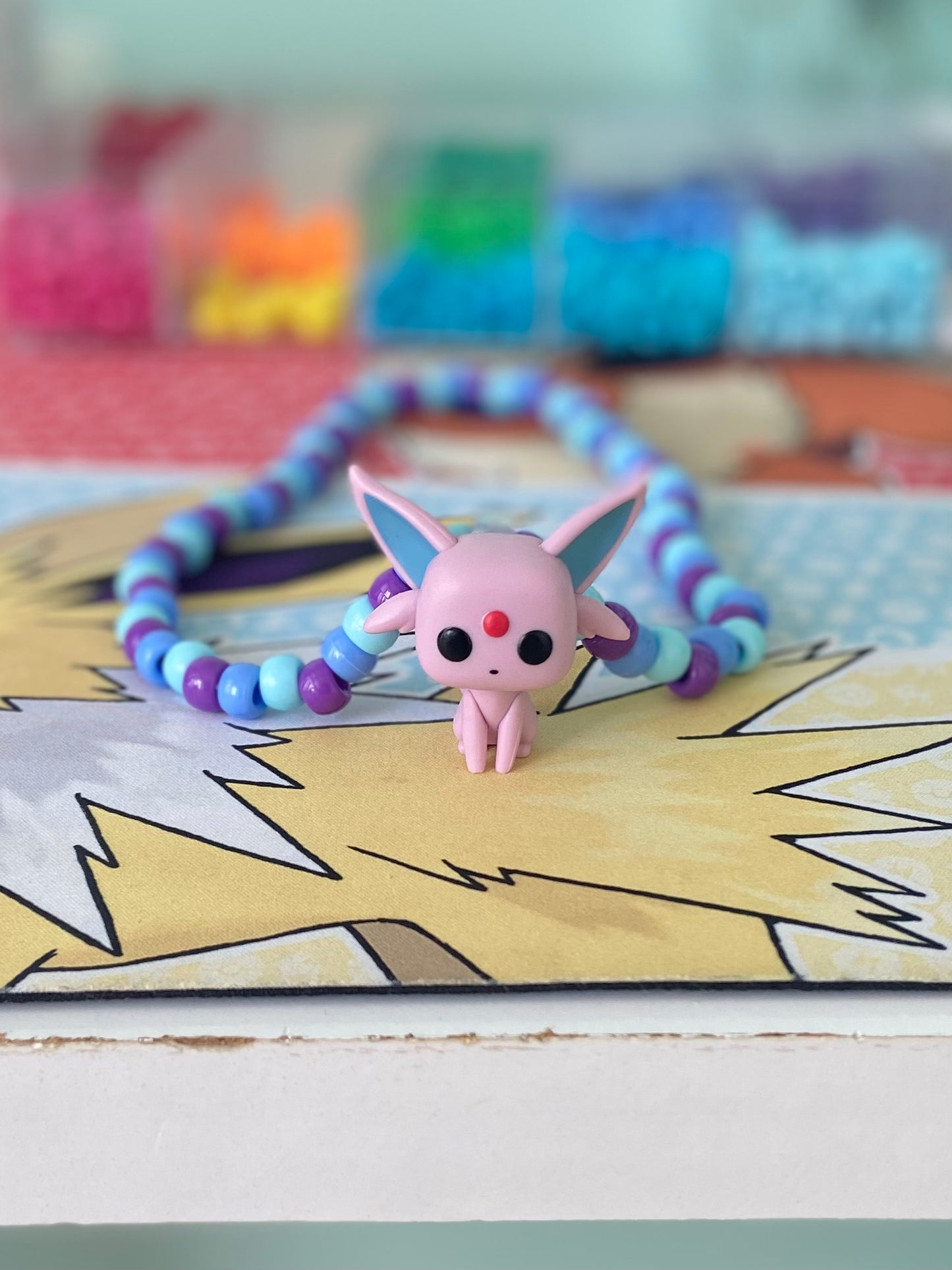 colar boneco espeon